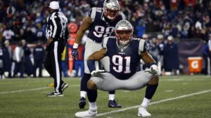 Defense Deatrich Wise and Trey Flowers