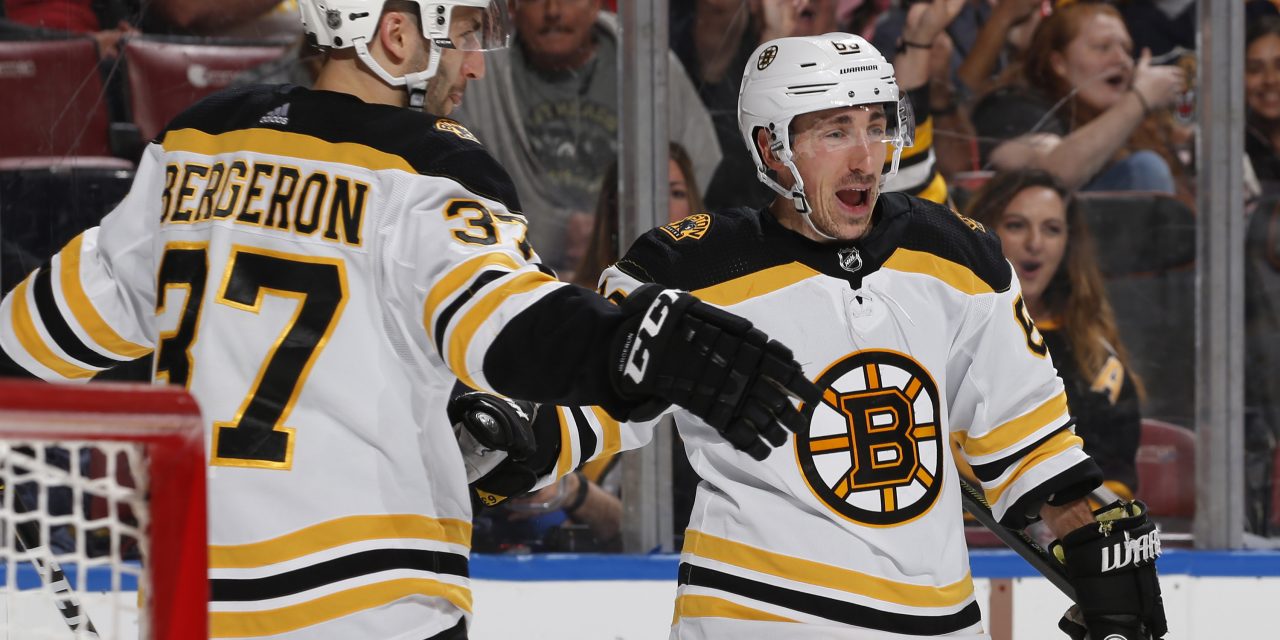 Boston Bruins Clinch Home Ice; Marchand Hits 100